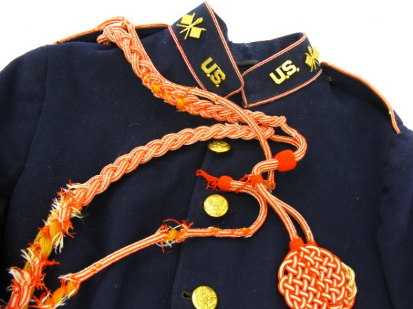 US ARMY M-1902 SIGNAL CORPS UNIFORM: 1902 pattern small size navy blue wool tunic with black polished cotton lining, orange and white piping around standing collar, cuffs and epaulettes, plus orange and white braided shoulder cord and pa