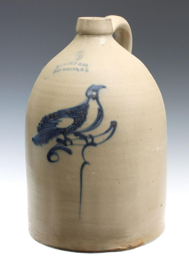 A BLUE DECORATED STONEWARE JUG SIGNED HAXSTUN & CO. (1 of 13)