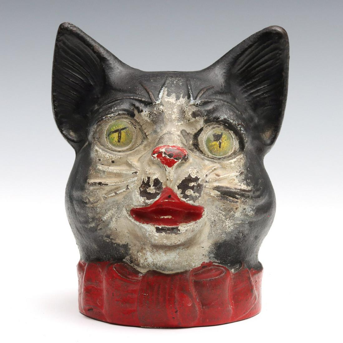 A RARE CAST IRON CAT HEAD STRING HOLDER CIRCA 1920s (1 of 12)