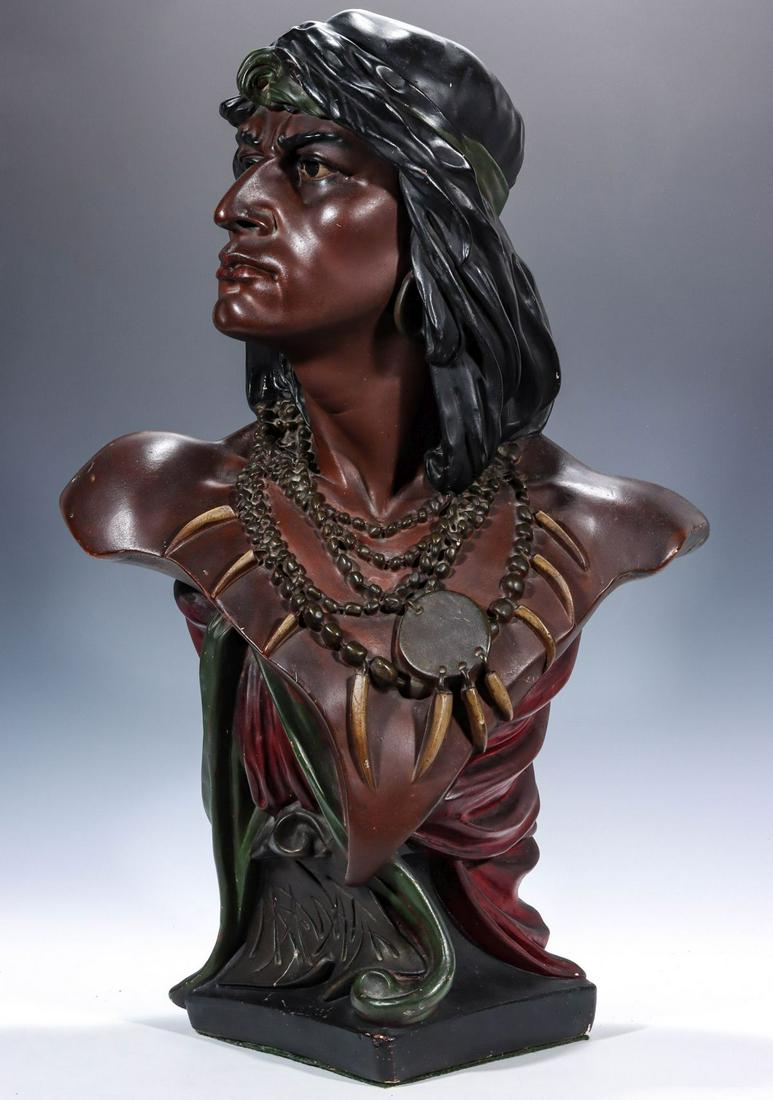EARLY 20C. CIGAR STORE INDIAN PLASTER BUST OF HIAWATHA: The detailed portrait bust in original paint, circa 1920s. Measures 29 x 18 x 10 inches. Provenance: The estate of Glenda St. John. We happily provide seamless in-house packing and shipping services o