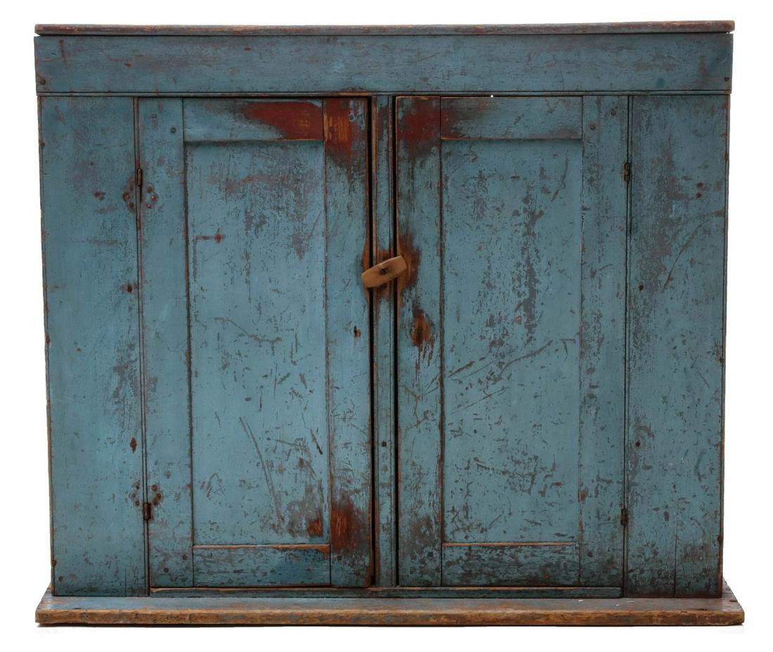AN UPSIDE DOWN CUPBOARD TOP IN OLD BLUE MILK PAINT. (1 of 11)