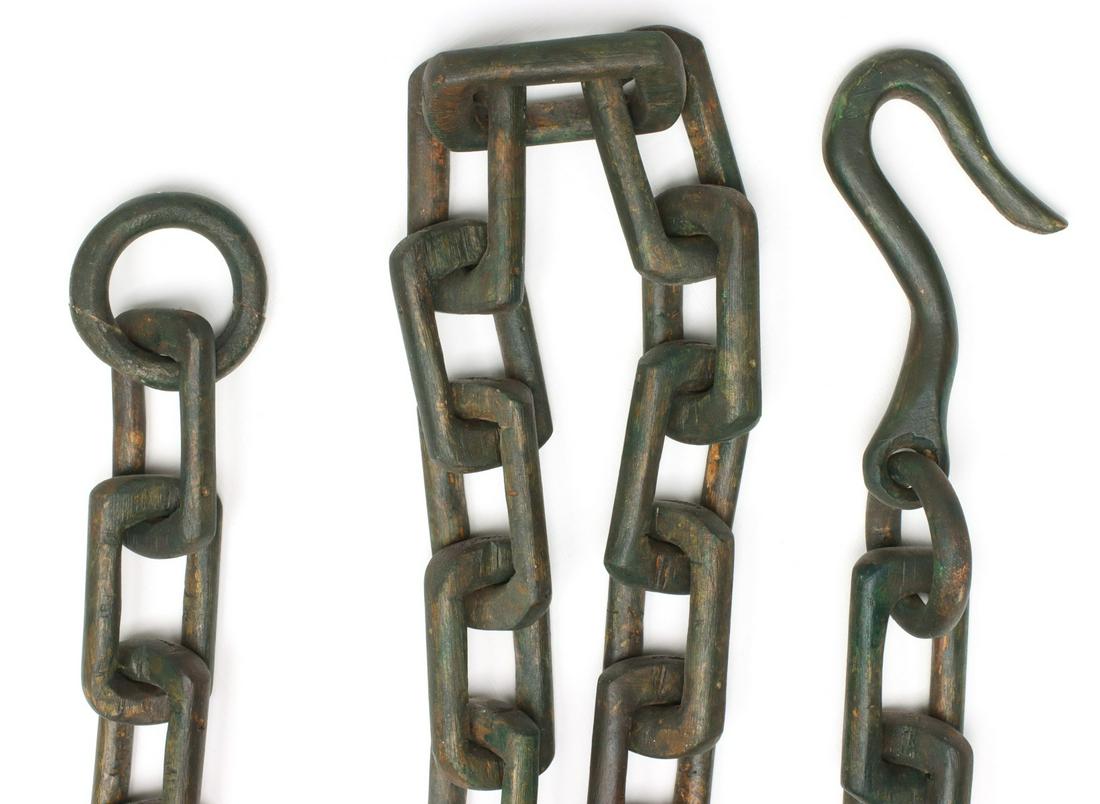 A CARVED WOOD FOLK ART CHAIN IN OLD GREEN PAINT (1 of 5)