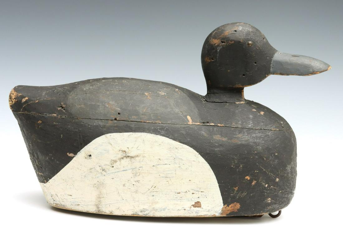 A PRIMITIVE DECOY PAIRED WITH A REPAINTED MASON DECOY (1 of 11)