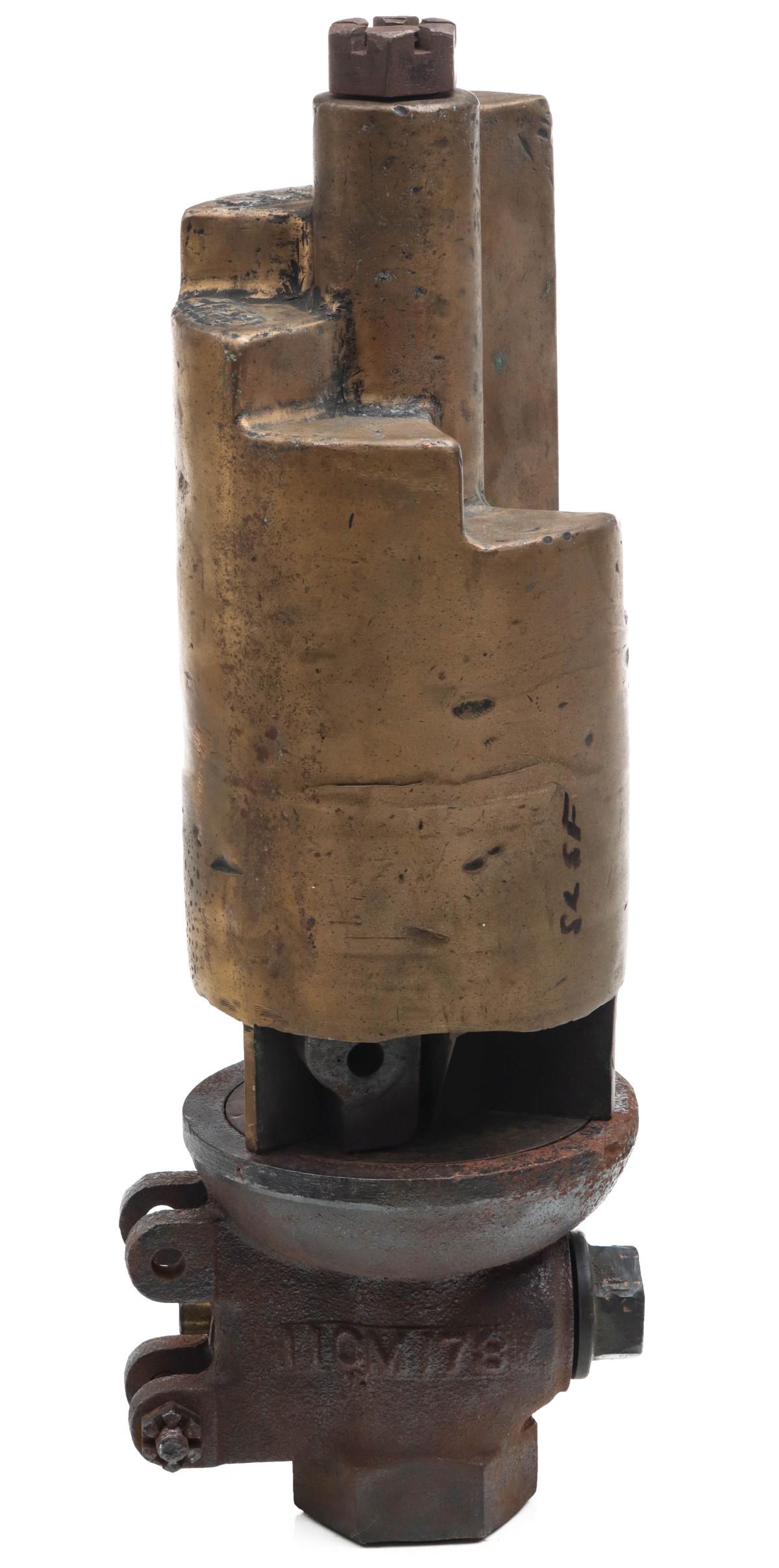 A SIX CHIME BRASS LOCOMOTIVE WHISTLE ATTRIBUTED FRISCO: The heavy brass six-chime step-top steam whistle with embossed numerals and mounted on iron valve assembly, the style of those manufactured in the Frisco shops and attributed as St. Louis and San Fran
