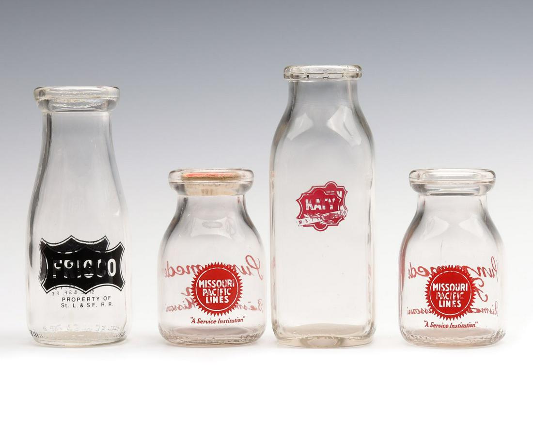 VINTAGE MILK AND CREAM BOTTLES WITH PAINTED RR LOGOS: The five examples with Frisco, Missouri Pacific, Great Northern and Katy railroad logos. Sizes range from 2 x 1.75 to 7 x 2.5 x 2.5 inches. We happily provide seamless in-house packing and shipping se