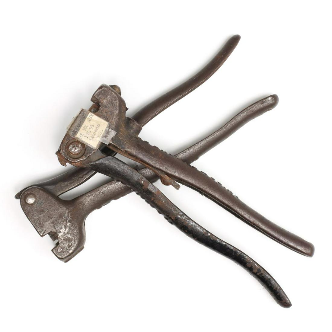 RAILWAY EXPRESS MONEY BAG SEALERS FOR MISSOURI STATIONS: One with die lettered RY EX AGY 19471 (Laredo Missouri) and one with die lettered AM RY EX 14528 (Oskaloosa Missouri), both manufactured by J. BROOKS & CO as embossed on the cast iron handle. Both mea