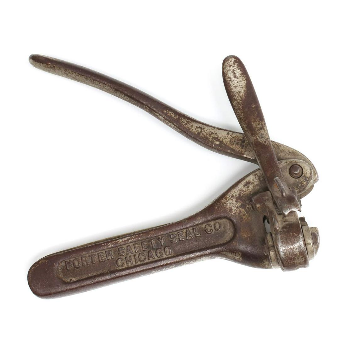 A WELLS FARGO MONEY BAG SEALER FOR THE ST. L & TEX: The cast iron Porter Safety Seal with die lettered W.F & CO. ST. L & TEX B852, patented June 1902. Measures 7 x 6 x 2.5 inches. We happily provide seamless in-house packing and shipping services on ne