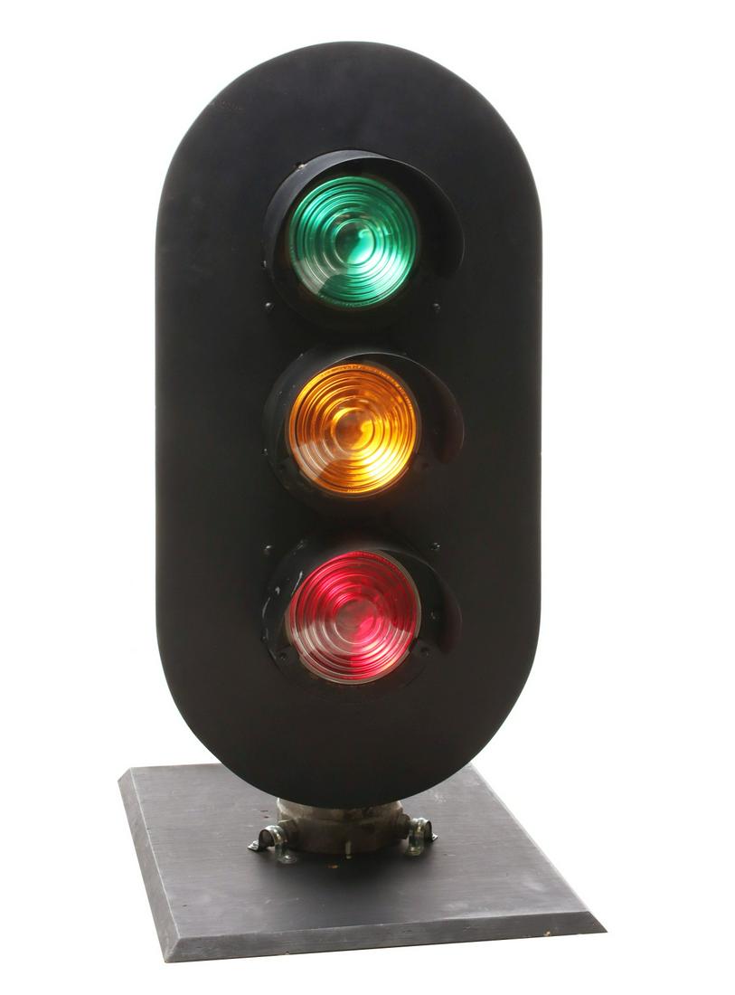 A UNION SWITCH AND SIGNAL RAIL YARD BLOCK SIGNAL: The cast iron housing embossed US&S with numerals, green, yellow and red glass lens signal lights. Measures 38 x 19 x 24 inches. We happily provide seamless in-house packing and shipping services on n