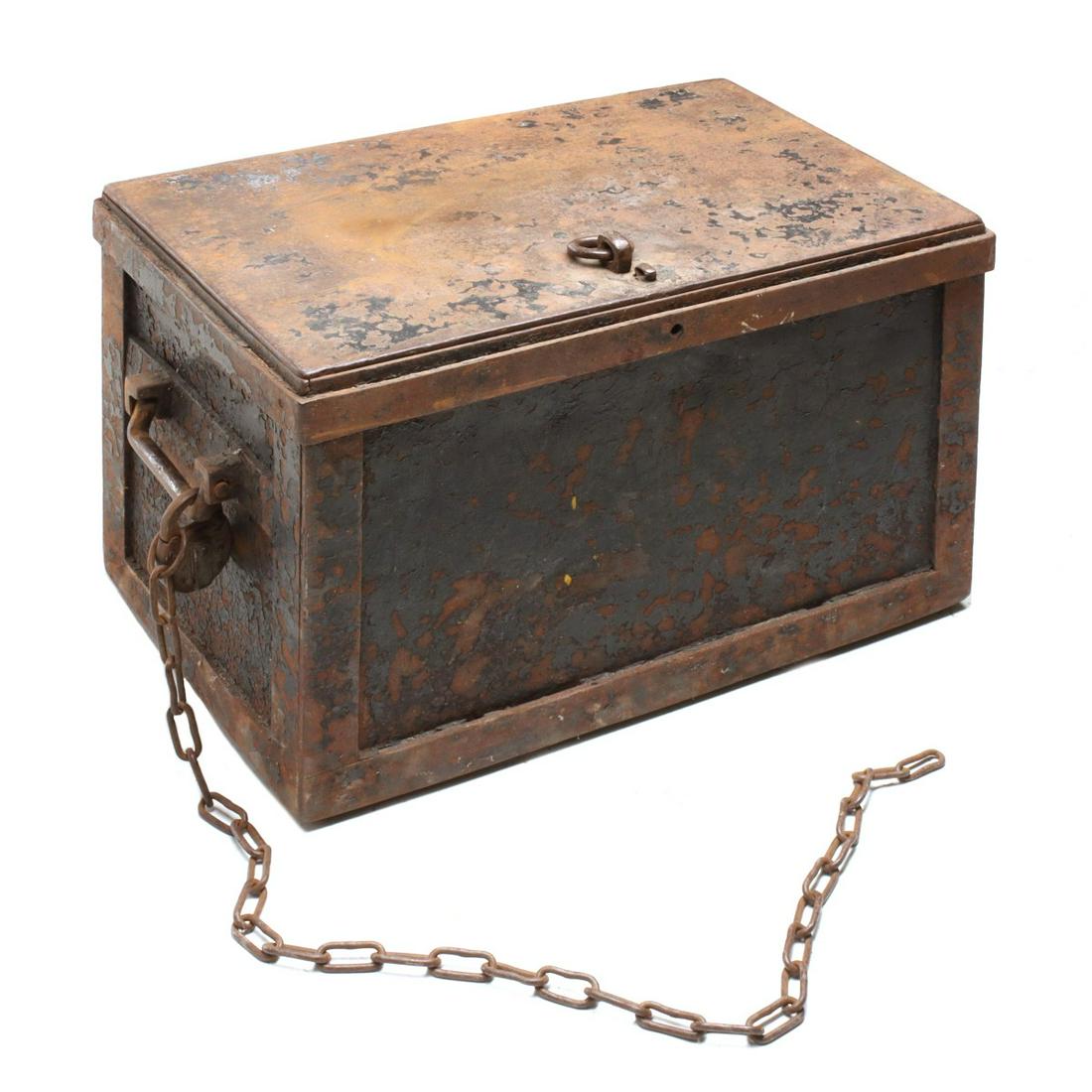 A HEAVY SHEET IRON STRONG BOX WITH RW EX AGY PADLOCK: The express box constructed of thick flat iron frame set with iron panels and hinged lid with eyelet centered by hand forged iron ring, iron swing handle each end including one with padlock stamped RW