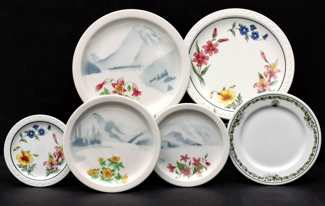 GREAT NORTHERN AND SOUTHERN PACIFIC RAILROAD CHINA: Three Great Northern Railroad 'Mountains and Flowers' pattern plates signed with green Syracuse China backstamps. And three Southern Pacific Lines 'Prairie Mountain Wildflowers' and 'Sunset - large fl