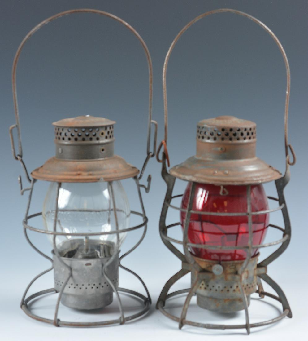ADLAKE RAILROAD LANTERNS FOR P.R.R. AND K.C.Ry..: An Adlake Reliable lantern marked Pennsylvania Lines on the shoulder, tall clear globe with cast markings of Pennsylvania Lines. Plus an Adlake Reliable lantern with markings (ground through) of 'K.C.
