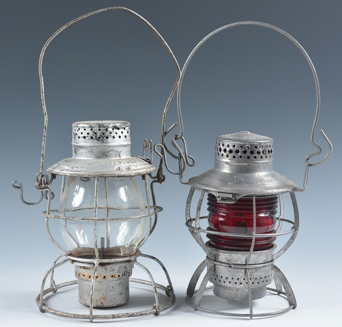 LANTERNS WITH RAILROAD MARKS ON FRAME AND GLOBE: The Handlan lantern marked FRISCO on the shoulder of the frame set with tall clear globe etched C.G.W.R.R. for Colorado & Great Western. Plus a Dressel lantern marked L&N on the shoulder for Louisvill