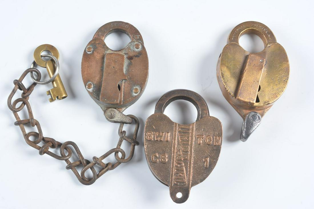 A COLLECTION OF PADLOCKS WITH RAILROAD MARKINGS: Three padlocks with markings for FRISCO, UNION PACIFIC and ETH&C for the Evansville, Terre Haute & Chicago Railroad, Frisco lock includes a key. We happily provide seamless in-house packing and shippi