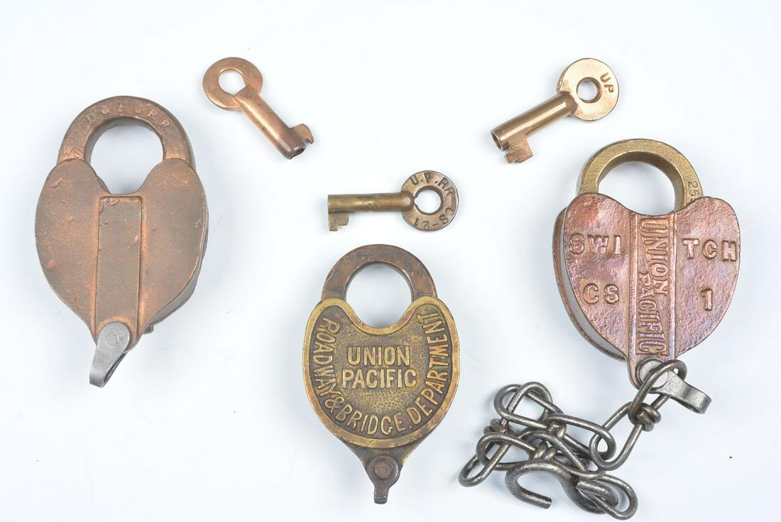 BRASS PADLOCKS FOR D.&R.G.R.R. AND UNION PACIFIC: Three locks include: A Fraim padlock stamped D.&R.G.R.R. on the shackle for the Denver & Rio Grande Railroad, stamped on the obverse of the shackle with the Fraim logo and 1913, key stamped DR/WS; A S