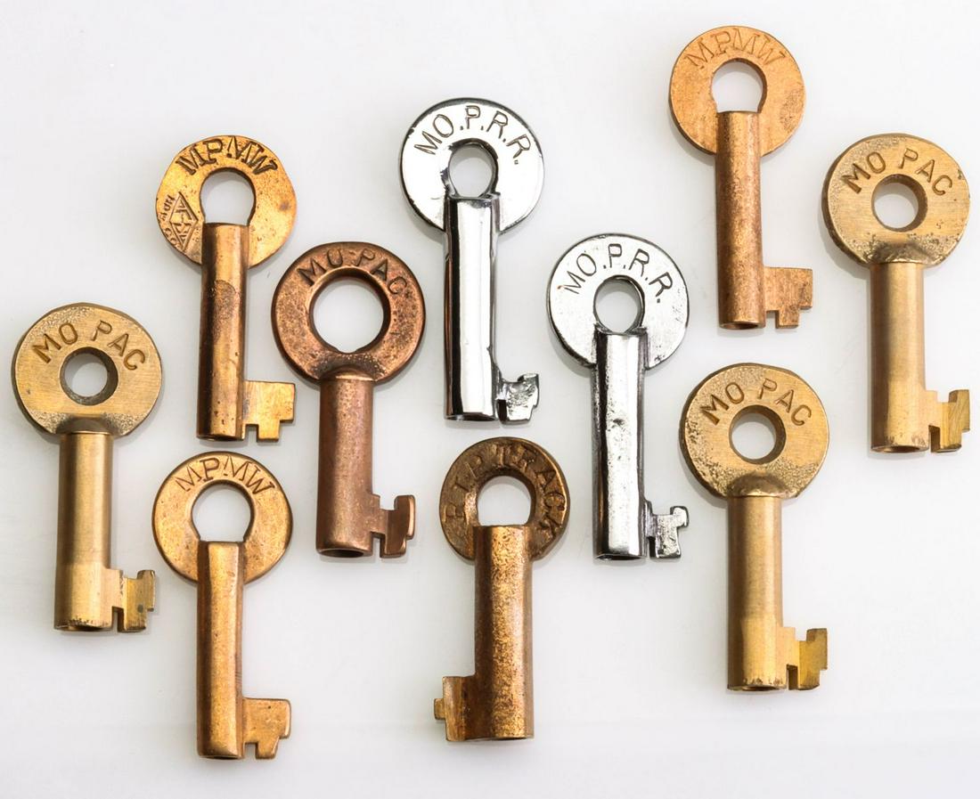 TEN RAILROAD SWITCH LOCK KEYS MoPAC AND MPMW: Ten switch lock keys with stamped markings for the Missouri Pacific Railroad, three stamped MPMW for Missouri Pacific Maintenance of Way. We happily provide seamless in-house packing and shipping serv