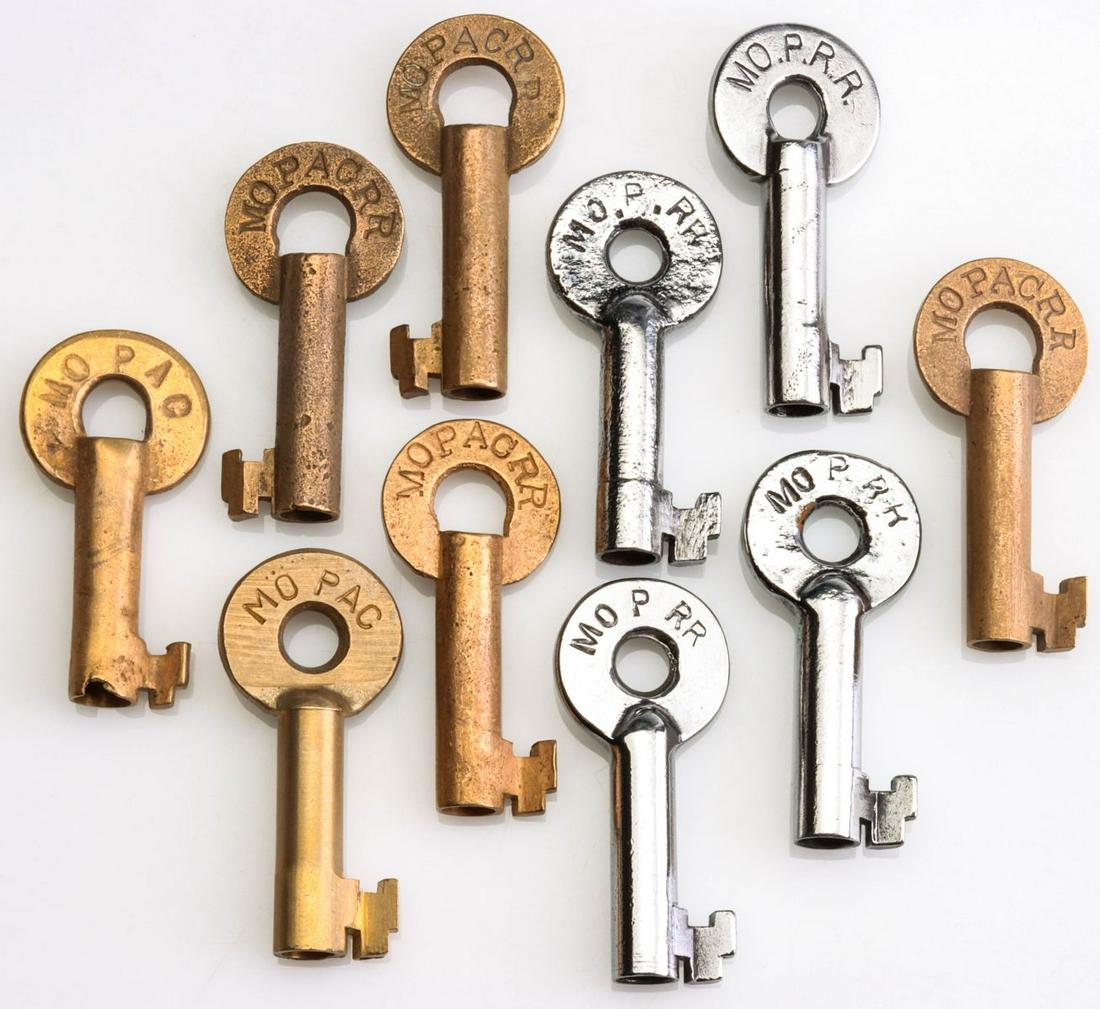 TEN MISSOURI PACIFIC RAILROAD SWITCH KEYS: Ten keys stamped MoPAC or MO.P.RR. We happily provide seamless in-house packing and shipping services on nearly everything we sell.