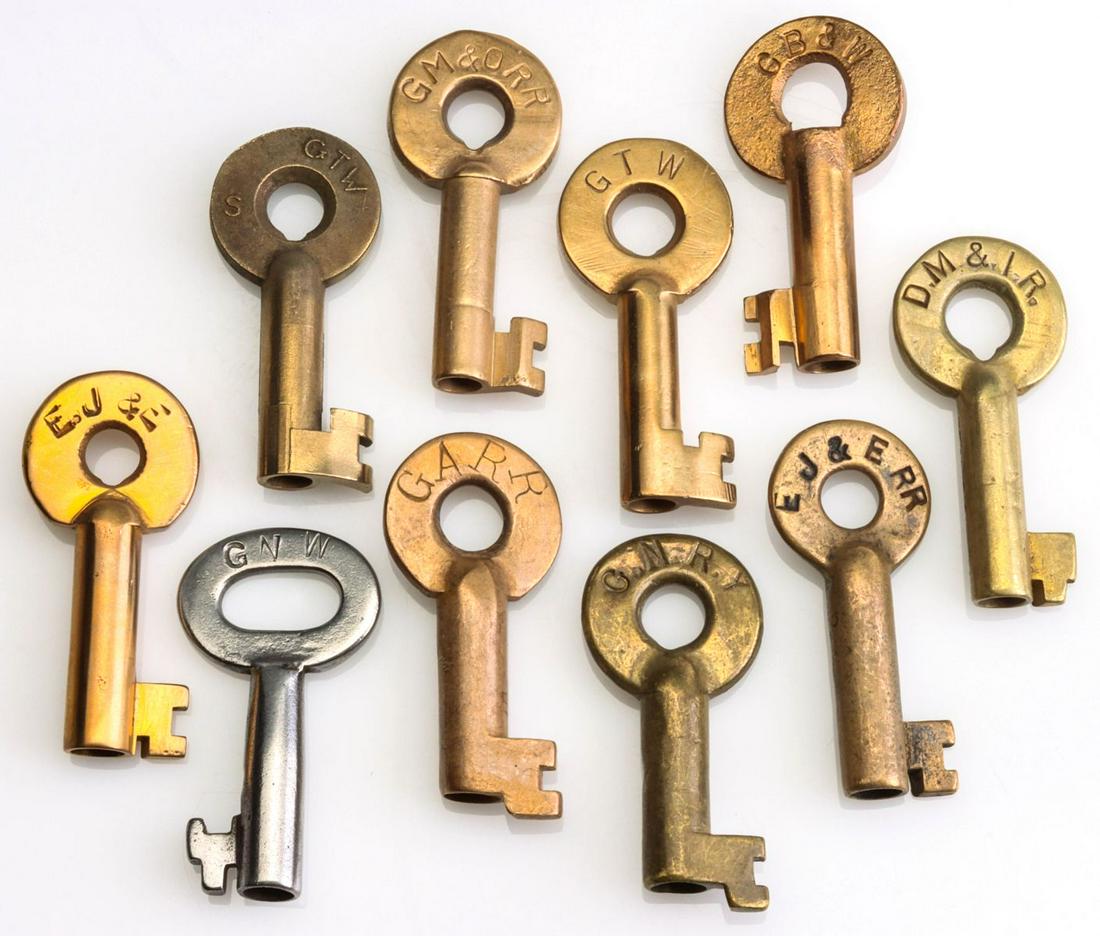 A COLLECTION OF SWITCH KEYS WITH RAILROAD MARKINGS: Ten railroad keys stamped G.T.W. for the Grand Trunk Western Railroad, E.J.&E. for the Elgin, Joliet and Eastern Railway, G.A.R.R. for the Georgia Railroad and Banking Company, D.M.&I.R., G.B.&W., G.M