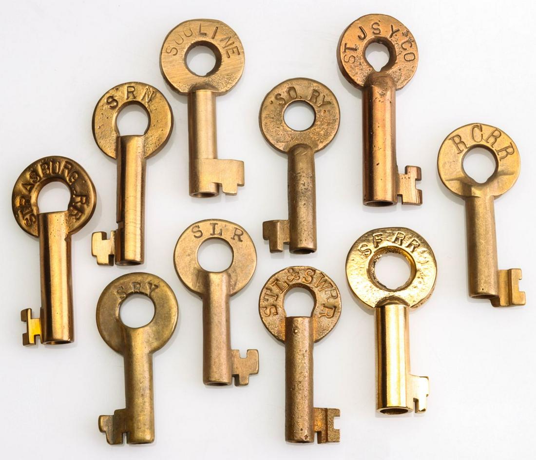 BRASS KEYS INCL STJSYCO, SLR, SFRR, SRY & STRASBURG RR: Ten brass keys with with stamped markings of SOOLINES, SORY, RCRR, SRN., ST.L&SW.RR., STJSYCO, SLR, SFRR, SRY and STRASBURG RR. We happily provide seamless in-house packing and shipping services on ne