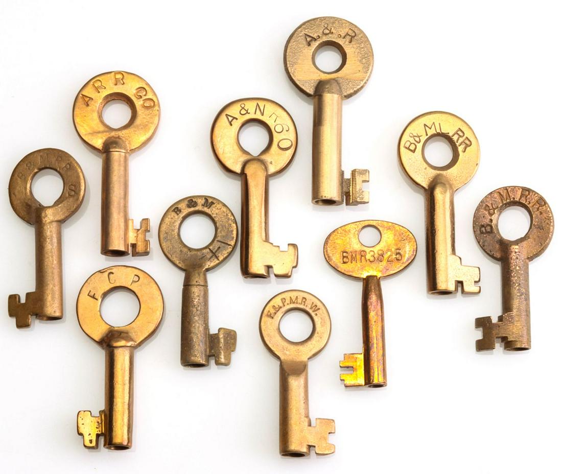 A COLLECTION OF SWITCH KEYS WITH RAILROAD MARKINGS: Ten brass railroad keys stamped B&MRR for the Boston and Maine Railroad (x4), FCP, A&R, A&NR, ARRCO, F&PMRW and BNR3825. We happily provide seamless in-house packing and shipping services on nearly ev