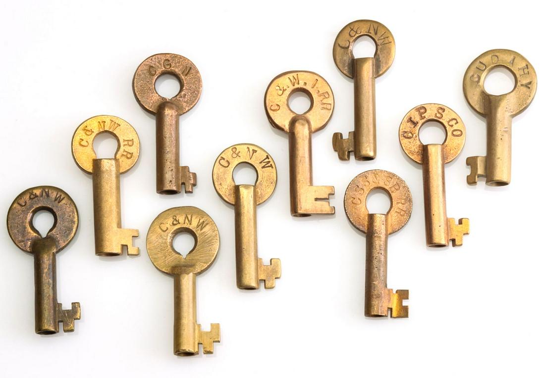 A COLLECTION OF SWITCH KEYS WITH RAILROAD MARKINGS: Ten brass switch keys stamped C&NW for the Chicago and North Western railroad (x5), CIPSCO, CGW, CSS&SBRR, C&WIRR and CUDAHY. We happily provide seamless in-house packing and shipping services on near