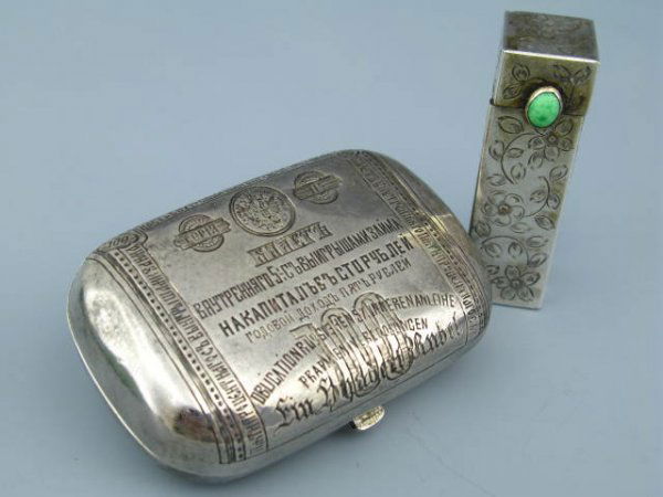 PRE-1908 RUSSIAN SILVER POLITICAL STATEMENT BOX: Measures 3 x 2 x 1 inches, pre-1908 left-facing kokoshnik silver mark and illegible maker monogram stamped to both the top and bottom halves. Primitive push button catch. Engraved front design of a On