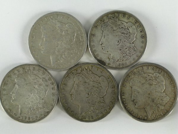 TEN MORGAN SILVER DOLLARS