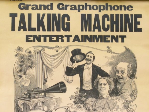 GRAND GRAPHOPHONE PAPER SIGN BROADSIDE: An old printed ad for a Grand Graphophone show, this printed broadside was part of a large warehouse find from many years ago. Framed to an overall measurement of 21 x 16.75 inches.