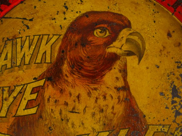 BURLINGTON IOWA & KANSAS CITY PICKLE ADVTG TRAY: A gem of Americana in tin litho picturing a naïve rendition of what appears to be a Peregrine Falcon , the mascot of Hawk Eye Pickles (Trademark) of Burlington Iowa and later, Kansas City. A wonderfu