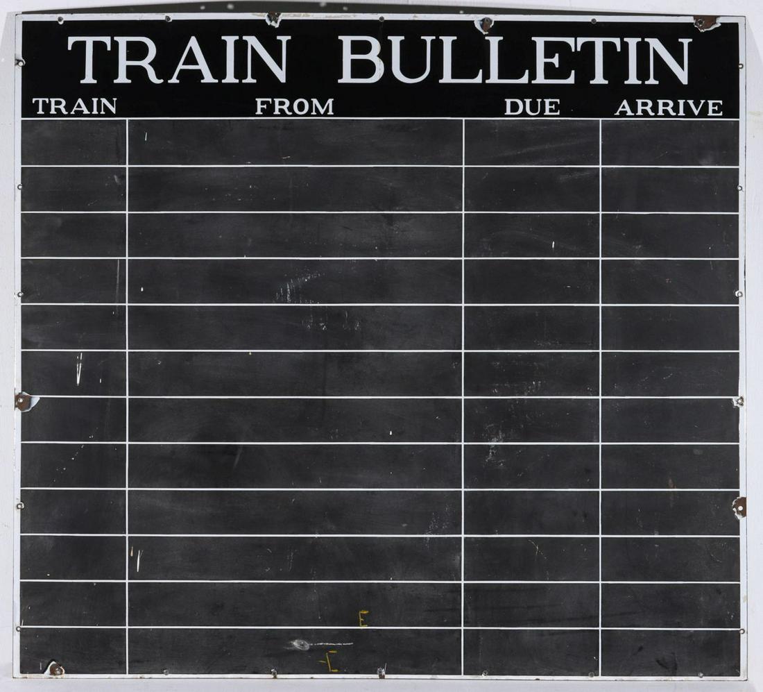 A LARGE PORCELAIN ENAMEL TRAIN BULLETIN SCHEDULE BOARD: The steel sign with porcelain enamel header over changeable grid created by a white porcelain enamel base layer overlaid with divided matte black coating to create a changeable grid for updating of de