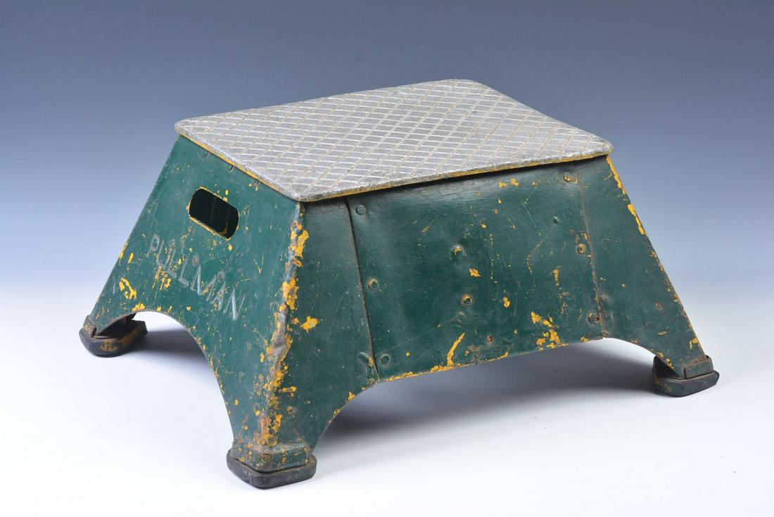 A STEEL AND ALUMINUM RAILROAD STEP BOX MARKED PULLMAN: The Pullman rail car step stool with debossed lettering on one end, open on two sides, a storage compartment is mounted inside, incised lettering of RICHMOND 6-38. Measures 10 x 21 x 17.5 inches. We h