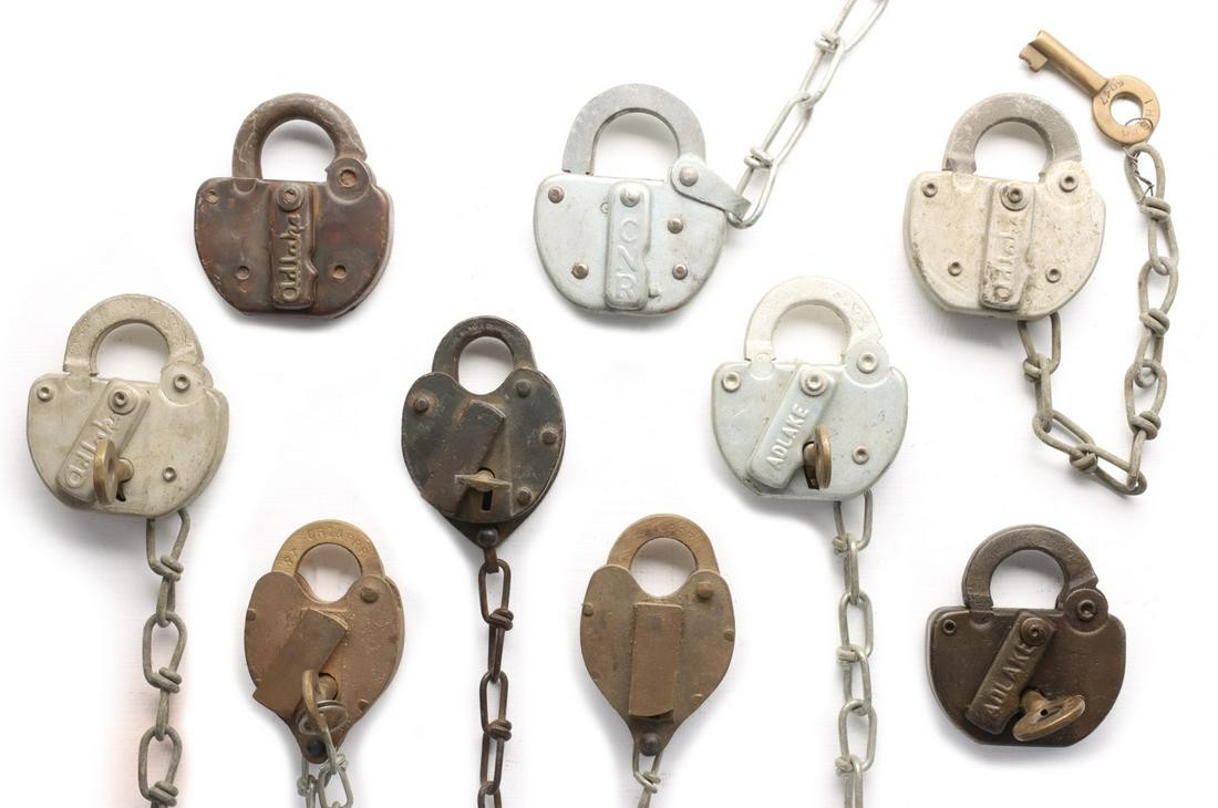 STEEL LOCKS AND BRASS LOCKS WITH RAILROAD MARKINGS: Includes: An Adlake lock stamped USY&T CO. for the Union Stock Yard and Transit Company, no key; An Adlake lock stamped P&PU for the Peoria and Pekin Union Railway, with key stamped P&PU; An H.W. Clim