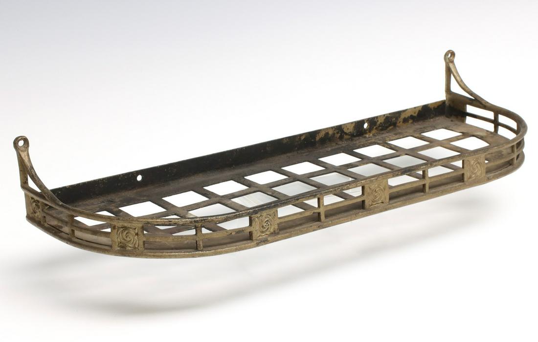 A BRASS WALL MOUNT RAILROAD PASSENGER CAR SHELF: The brass basket shelf with Hunter Rose decorative castings. Measures 2.5 x 16.75 x 6 inches. We happily provide seamless in-house packing and shipping services on nearly everything we sell.
