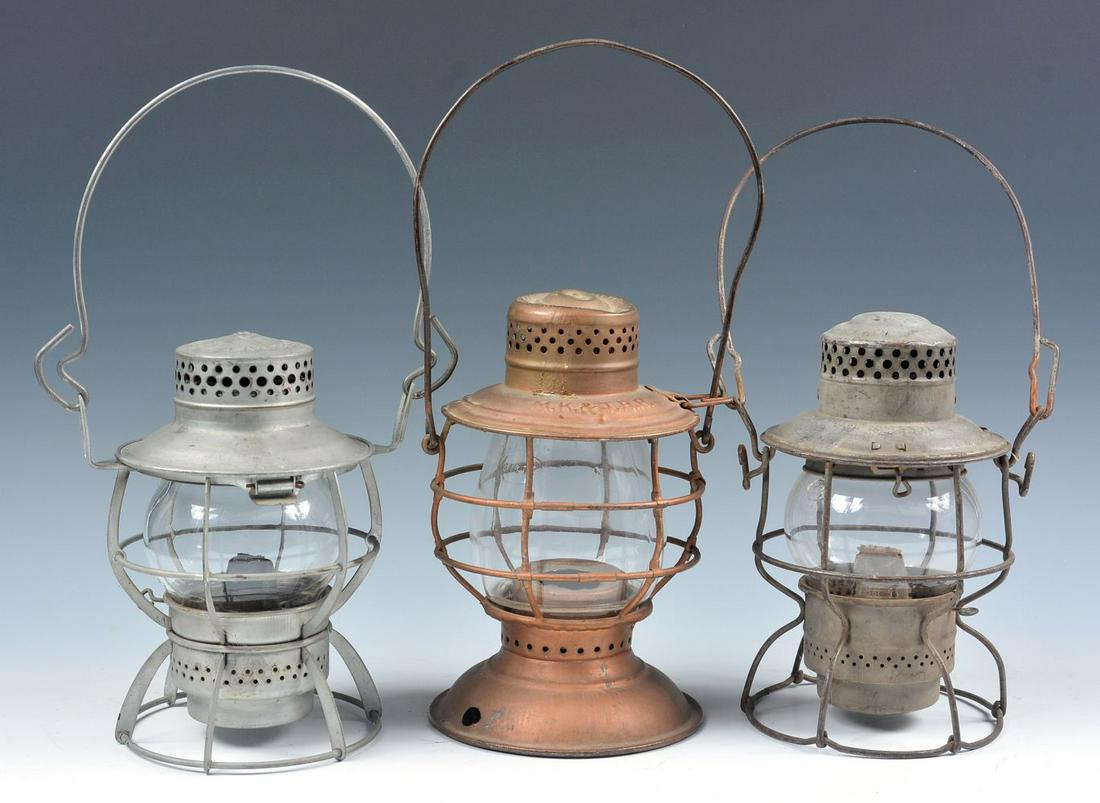 G.M.&O., I.C.R.R. AND M-K-T RAILROAD LANTERNS: Includes: A Dressel lantern frame marked GM&O RR on the shoulder for the Gulf, Mobile & Ohio Railroad, short clear globe; A Handlan Buck lantern frame marked M.K.&T.R.R. on the shoulder for the Missou