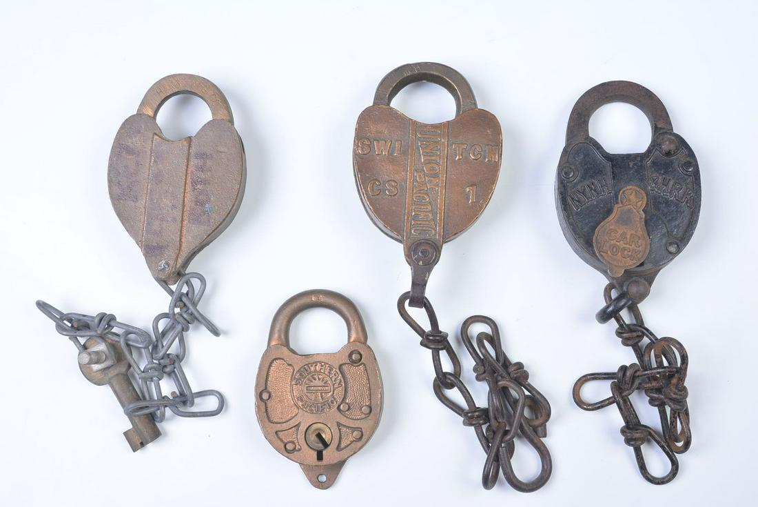 A COLLECTION OF PADLOCKS WITH RAILROAD MARKINGS: Includes: A Hansl Mfg. Co. padlock stamped C.R.I.&P.R.R. on the shackle for the Rock Island Railroad, key stamped CRI&PRR; A brass padlock with raised lettering SOUTHERN PACIFIC, no key; An Adlake swi