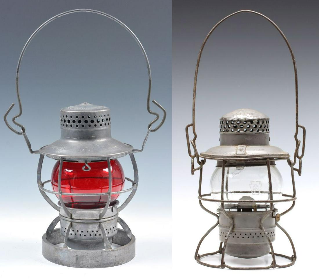 UNUSUAL READING RR 'LOCO DEPT' LANTERN AND PRR LANTERN: The Dressel short globe lantern frame with unusual circular base marked READING CO. and LOCO DEPT. on the shoulder, set with short red globe without markings. Plus a P.R.R. lantern with embossed maker