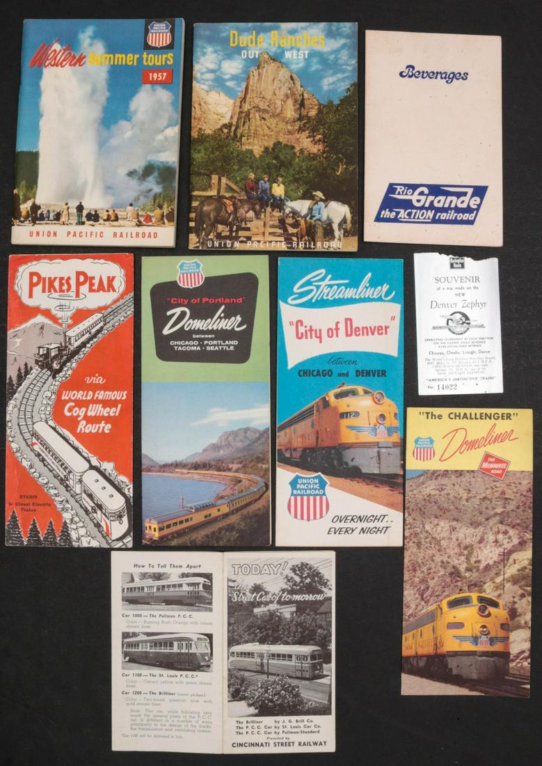A COLLECTION OF RAILROAD PAPER EPHEMERA: Including a 1956 Handlan lanterns catalog, tourist brochures, timetables, Railroad Picture Book copyright 1898, transit maps, 1968 The Official Guide of the Railways, and more. We happily provide seam