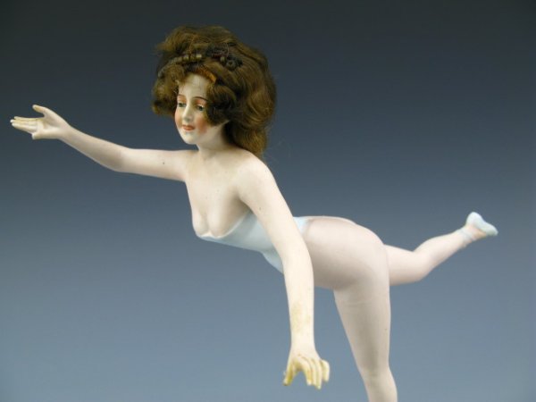 VERY RARE GERMAN BATHING BEAUTY W/REAL HAIR: Circa late 1800s, measures approximately 9.5 x 9 inches on stand, painted facial features and light blue corset and ballet slippers, genuine dark blonde human hair with bead ornaments throughout, hole