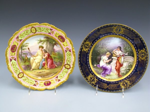 BEEHIVE & MOREAU HAND PAINTED PLATES: Both 9.5 inch in diameter, Beehive with a classical scene of young woman kneeling beside a goddess with a staff. Blue overerglazed beehive to reverse with 'Bauhantinen,' nice gold enamels, other is a 