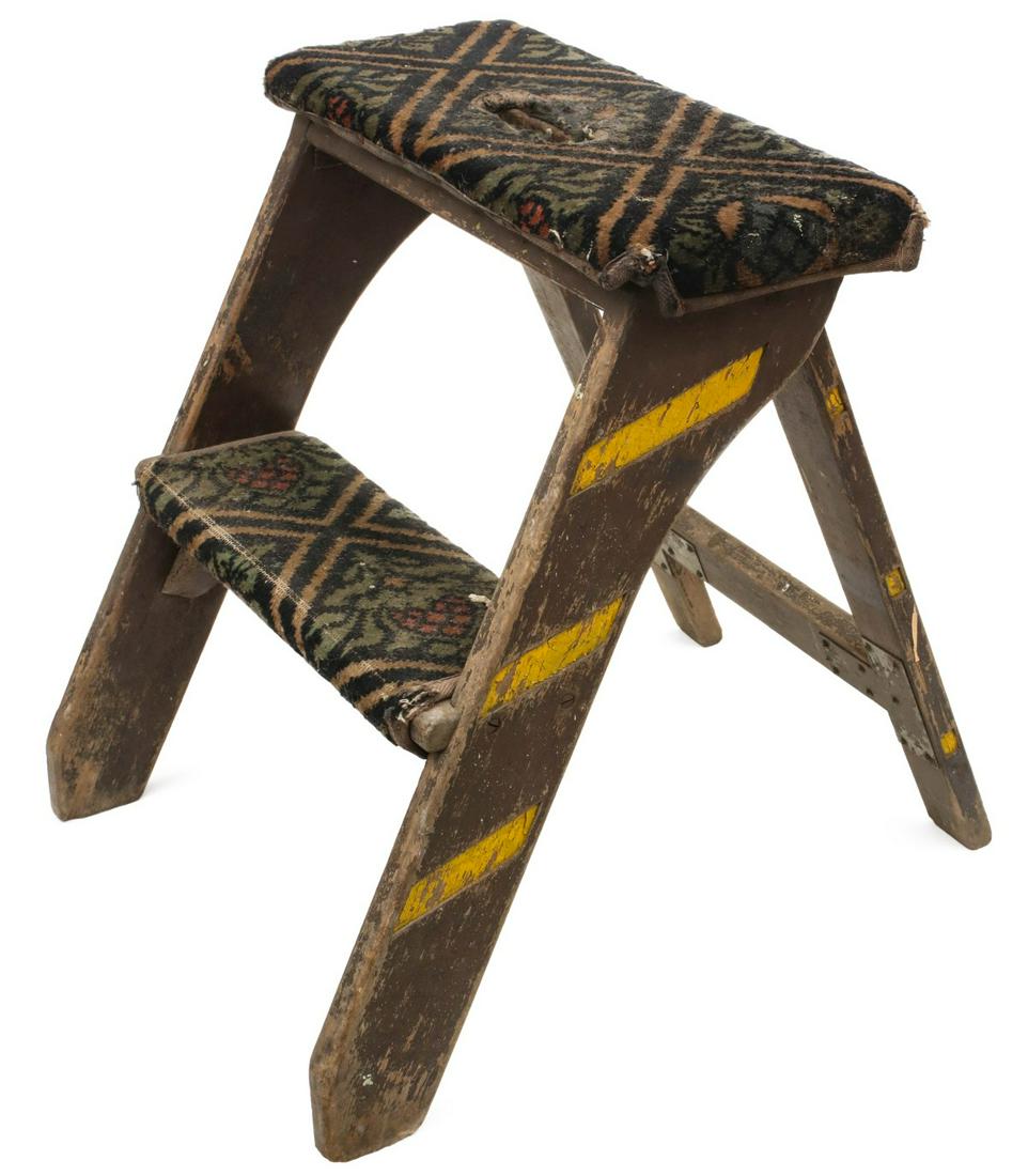 A PULLMAN PORTER'S STEP LADDER WITH CARPET COVERING: The folding wood step signed PULLMAN in yellow paint, original Pullman carpet covering, illustrated in Pullman Car Supplies and Equipment Catalog, item S-125. Measures 24 x 18 inches. We happily provi
