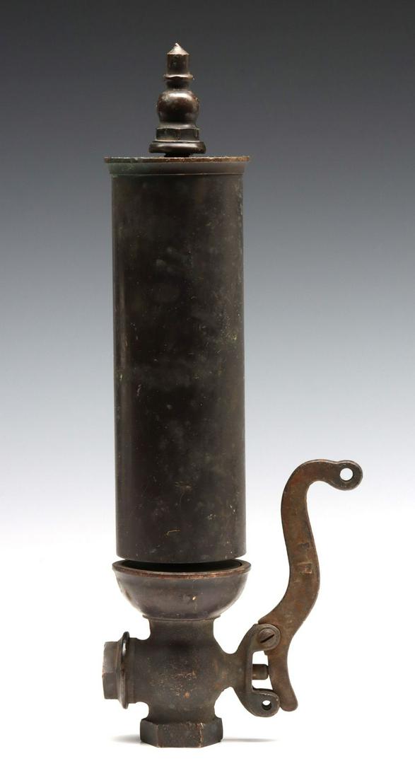 A PATINATED 8-INCH FLAT TOP SINGLE NOTE BRASS WHISTLE: The unmarked brass whistle with ornate finial on brass valve, dark, untouched patina and iron side-pull lever. Measures 13.5 inches, 8 inches in diameter. We happily provide seamless in-house packing 