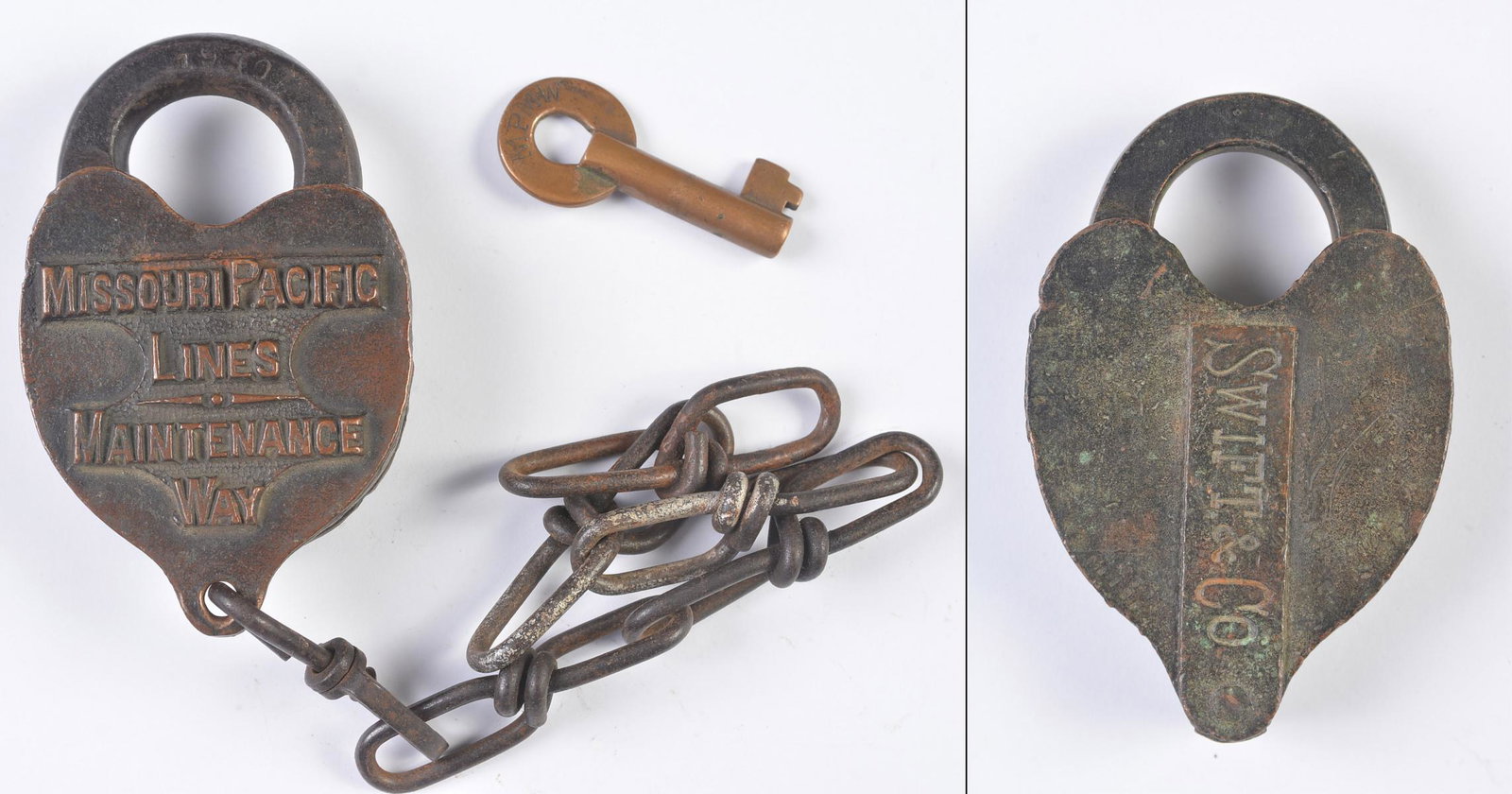 A MISSOURI PACIFIC RR MAINTENANCE WAY PADLOCK W/ KEY: The heart shape brass padlock embossed MISSOURI PACIFIC LINES MAINTENANCE WAY, key stamped MPMW. Plus a heart-shaped padlock marked SWIFT & CO. on the front, signed CORBIN CABINET LOCK CO. on the 
