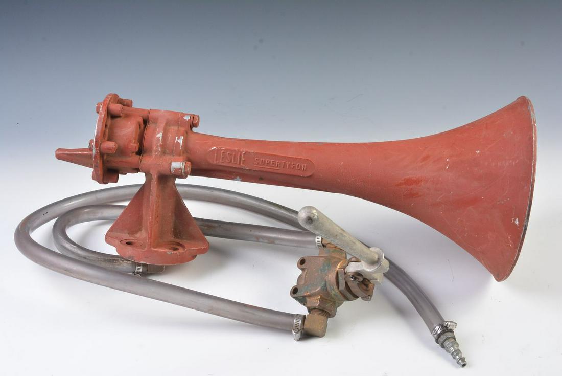 A LESLIE SUPERTYFON SINGLE NOTE DIESEL LOCOMOTIVE HORN: The aluminum air horn as shown and in working order, the patent number is for an 'acoustical signal apparatus' registered in the year 1977. Measures 9 x 2.5 x 9 inches. We happily provide seamless in-