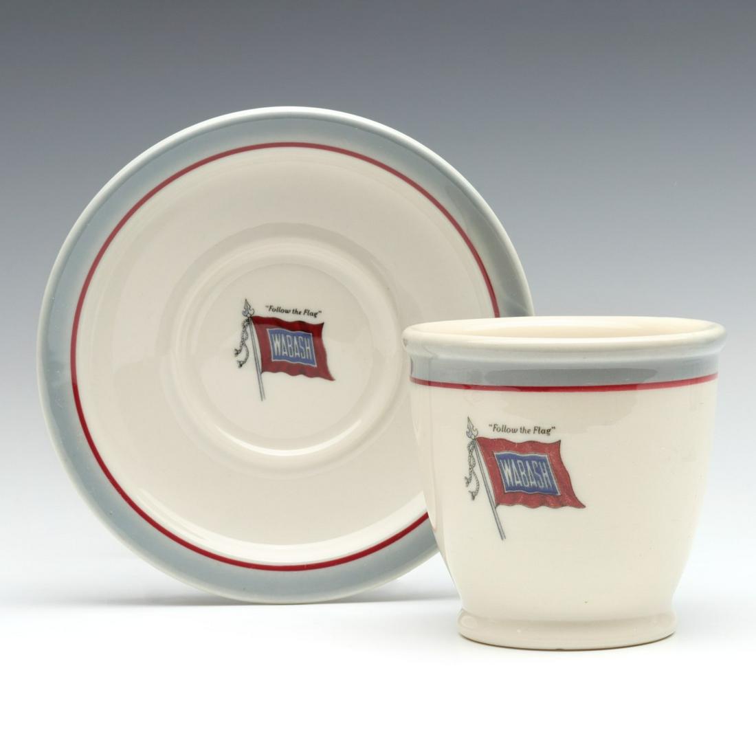 A RARE WABASH DOUBLE EGG CUP WITH UNDERPLATE: The double egg cup and underplate with Wabash Railroad Banner logo and color scheme; Syracuse China maker's back stamp. Underplate measures 5.25, cup is 3.125 inches. We happily provide seamless in-ho