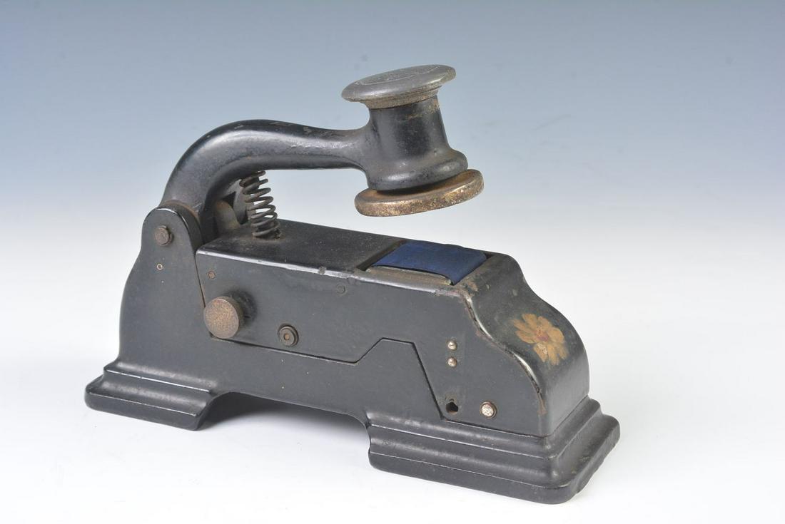 COSMO DATE STAMP FOR THE SPOKANE UNION STATION: The iron ticket validator with adjustable date stamp and die for SPOKANE UNION STATION. Measures 6.5 x 8.5 x 3 inches. We happily provide seamless in-house packing and shipping services on nearly ever