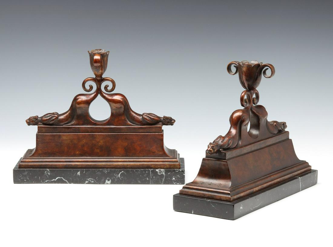 TIM CHERRY (B. 1965) MODERNIST BRONZE CANDLEHOLDER PAIR: Tim Cherry (Born 1965) Guardians of the Light 1994 The pair of bronze candle holders modeled as stylized stalking mountain lions other other big cat back-to-back on plinth mounted to black marble base