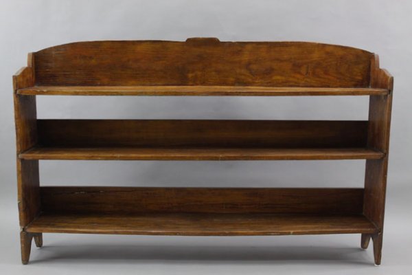 19TH CENTURY LARGE BUCKET BENCH: Natural tone with three shelves, high top back, boot jack-style legs, measures 39 x 62.25 x 10.25 inches.