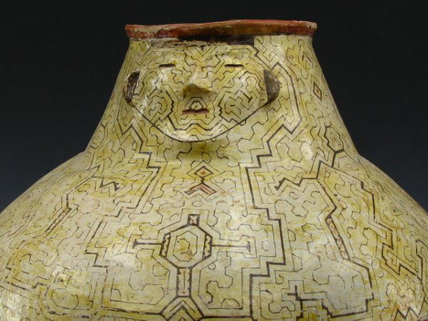 MONUMENTAL SHIPIBO POTTERY EFFIGY VESSEL27 INCHES: South American vessel with unusual human effigy face, measures 27 x 27 inches.