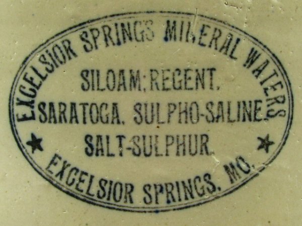 RED WING STONEWARE JUG EXCEL. SPRINGS MINERAL WATERS: Massive 5 gallon Red Wing advertising jug measuring 16.5 x 11.5 inches, underglazed black "Excelsior Springs Mineral Waters, Siloam Regent, Saratoga, Sulpho-Saline Salt-Sulphur, Excelsior Springs, MO.
