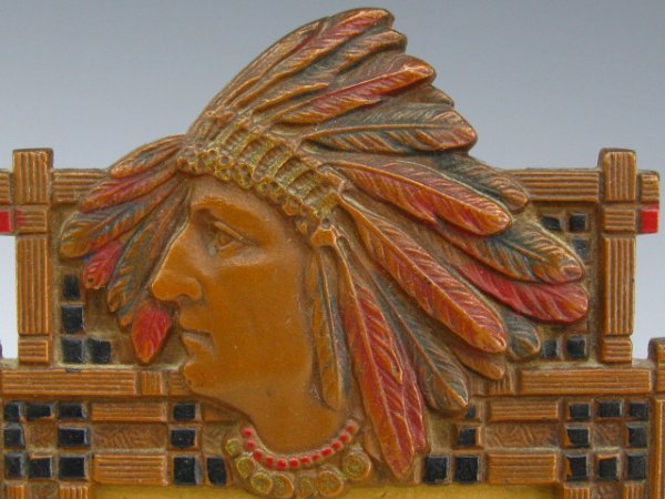 CAST IRON INDIAN HEAD EASEL BACK PHOTO FRAME: Cast iron frame with painted details, indian in headdress profile to top, swivel arm to back, embossed 5658.