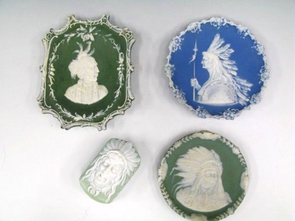 ANTIQUE GERMAN JASPERWARE W/AMER. INDIAN MOTIF: Includes three hanging wall plaques & plates; a 6.5 x 5.25 inch ornate piece, white on green, image of a native American with crucifix earrings and bone breastplate, unmarked reverse; a 4.75 inch diam